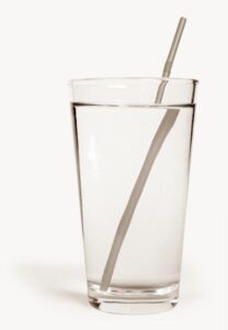 Straw appearing to be bent due to refraction